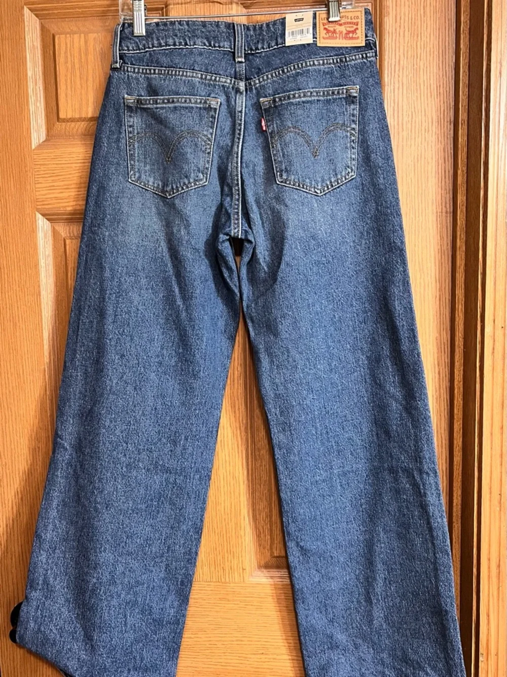 Levi's Superlow Loose Wide-Leg Jeans in Medium Blue Wash - Picture 2 of 8